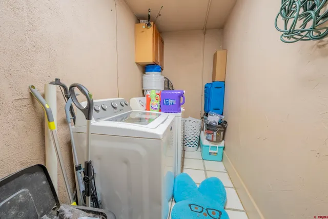 a bedroom with furniture and a view of entryway