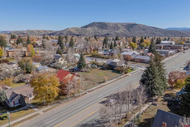 an aerial view of city and lake view