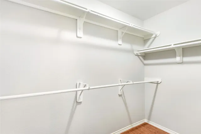 a view of a room with racks on the wall