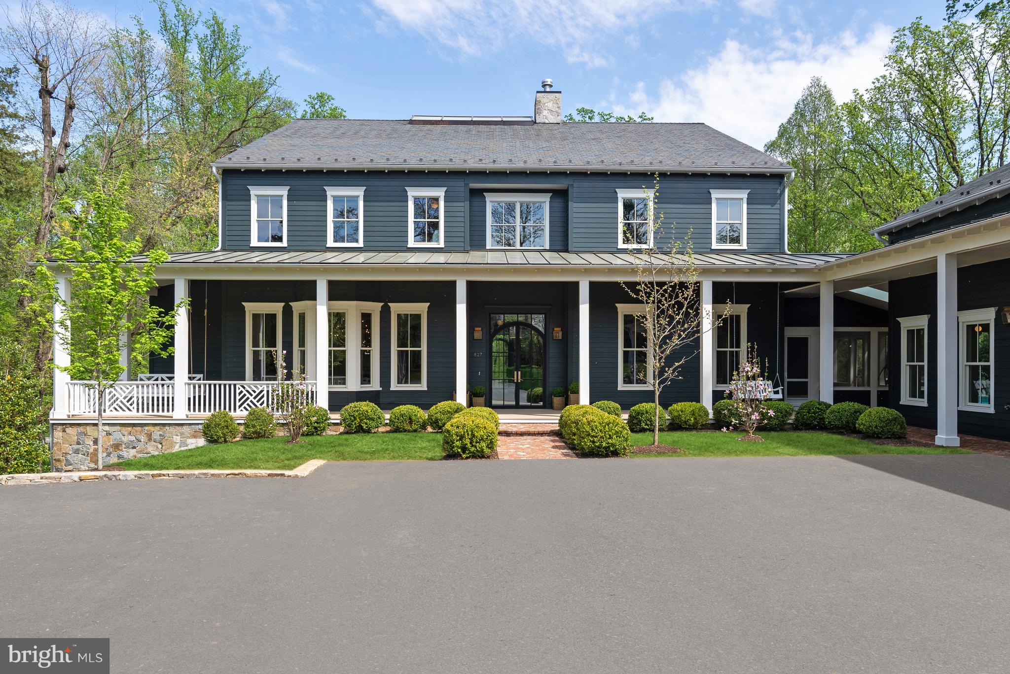 front front view of a house with a garden