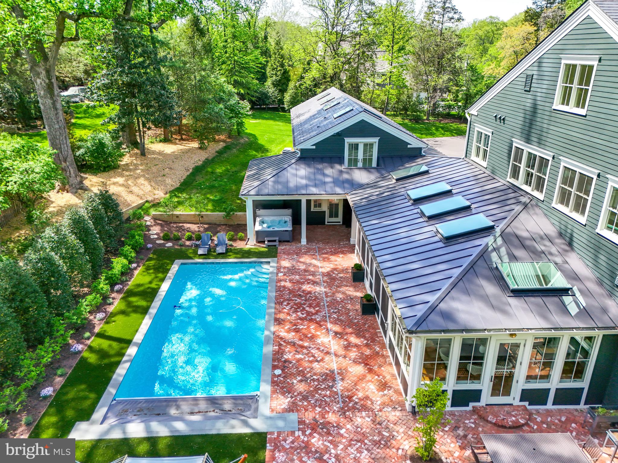 827 Turkey Run Road McLean, VA 22101 - Photo 2 of 6 a front view of a house with garden