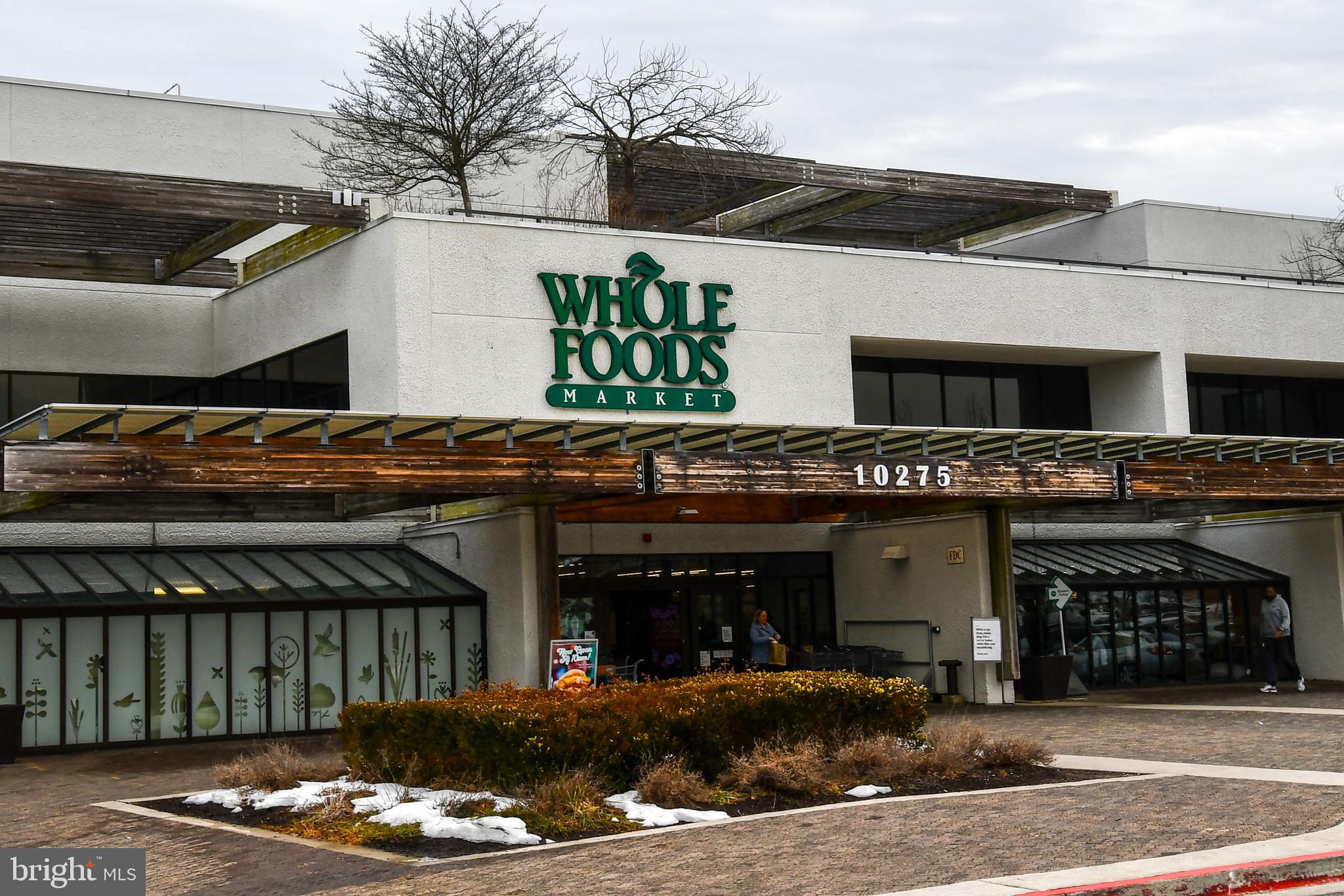 11796 Lone Tree Court Columbia, MD 21044 - Photo 45 of 45 a front view of a building with garage