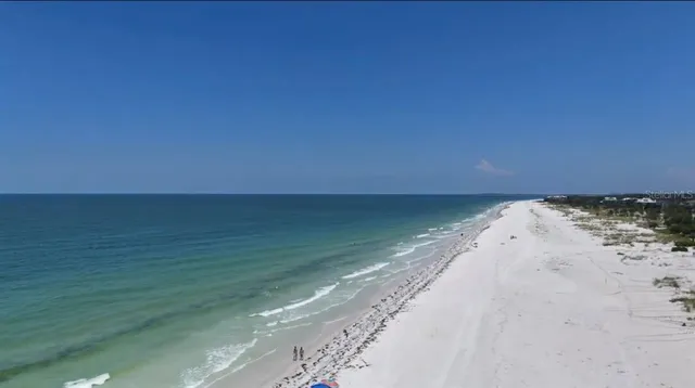 a lobby with furniture and flat screen tv