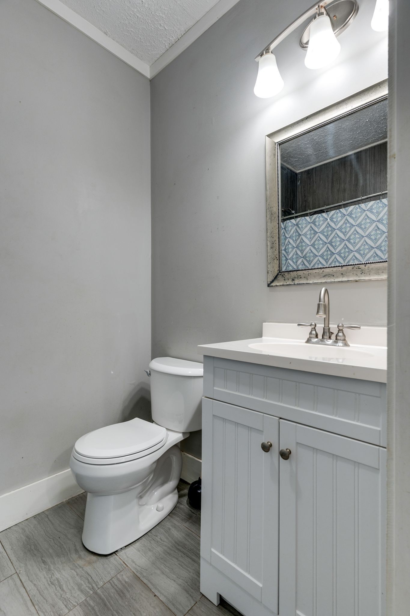 101 Fairfield Road Bethpage, TN 37022 - Photo 18 of 35 a bathroom with a sink toilet and mirror