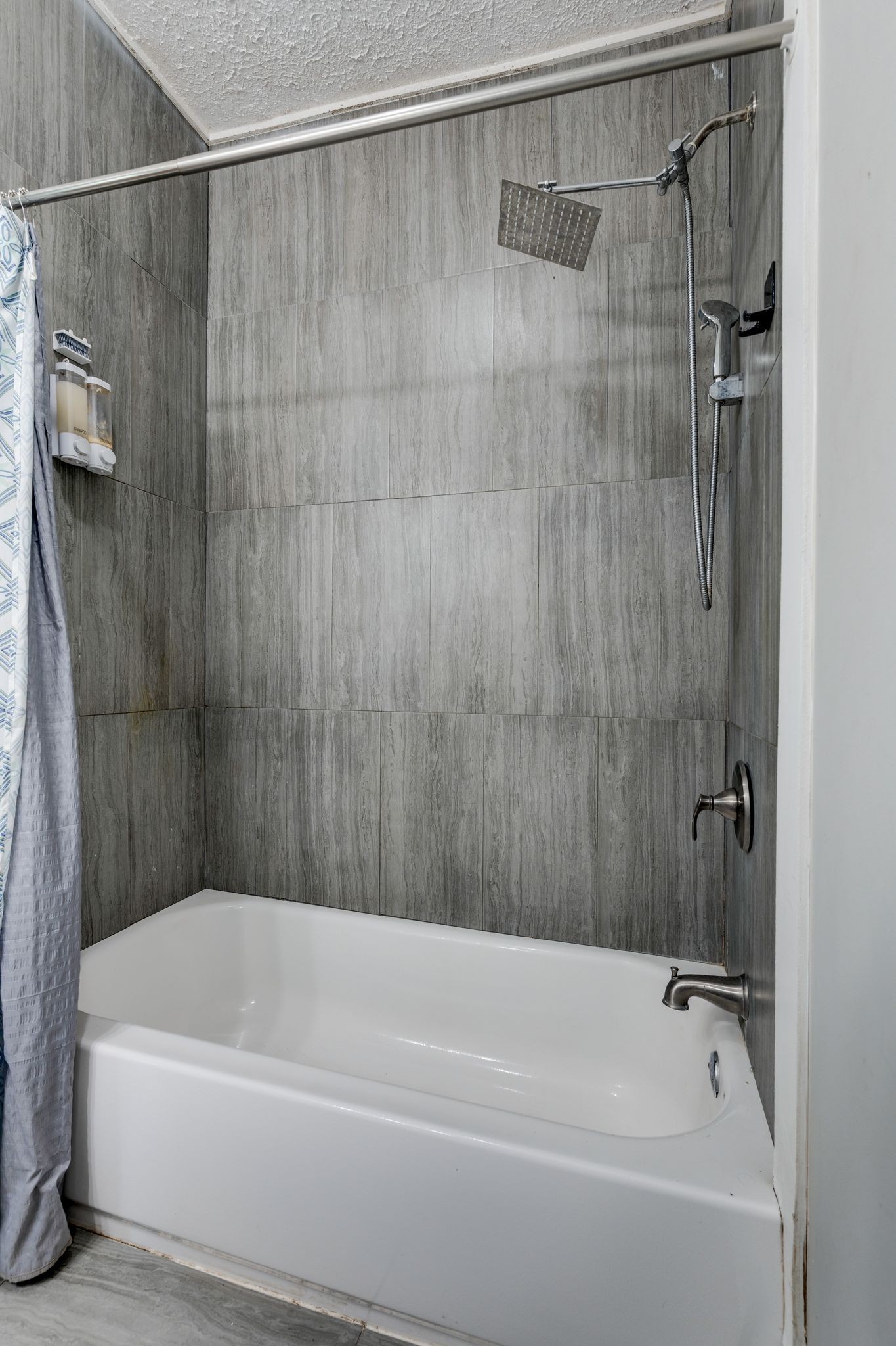 101 Fairfield Road Bethpage, TN 37022 - Photo 19 of 35 a bathroom with a bathtub and a shower