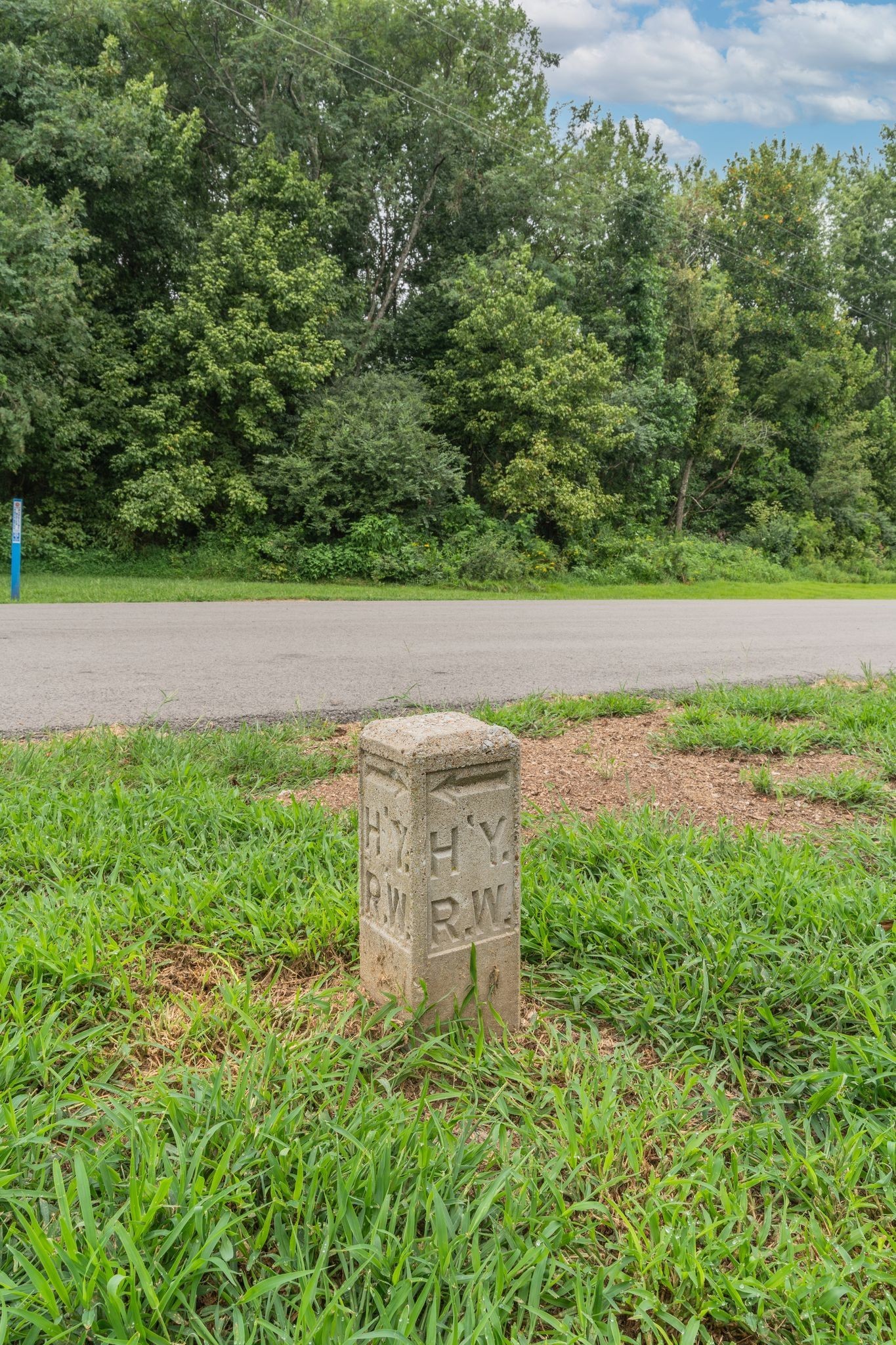 101 Fairfield Road Bethpage, TN 37022 - Photo 6 of 35 a view of a garden with a bench