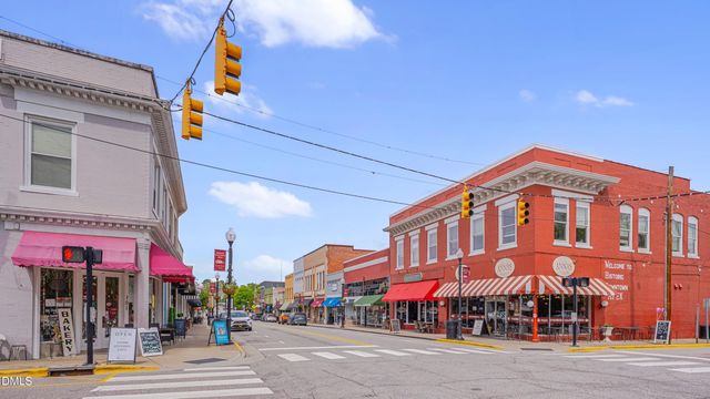 a view of a building with sitting area