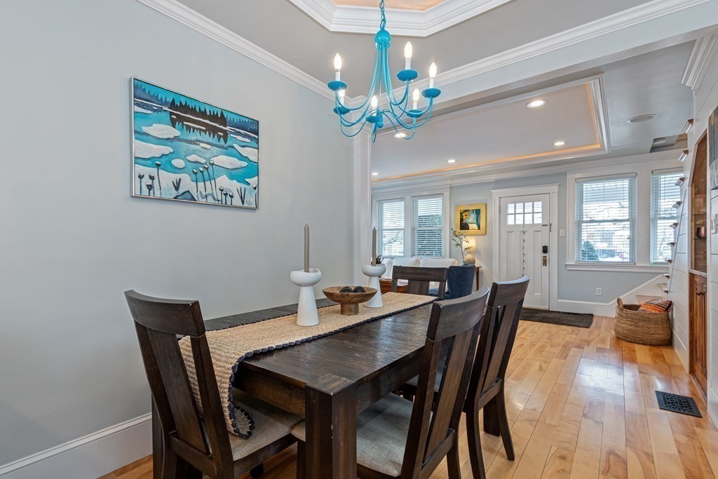 6 Storey Avenue Newburyport, MA 01950 - Photo 17 of 41 a view of a dining room with furniture wooden floor and chandelier
