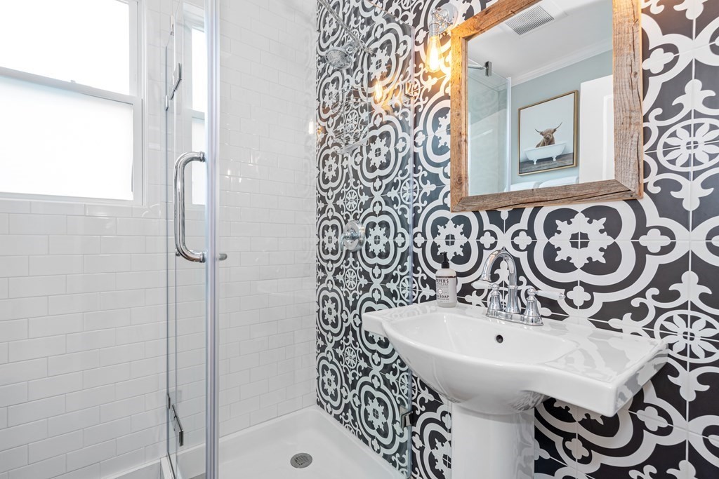 6 Storey Avenue Newburyport, MA 01950 - Photo 21 of 41 a bathroom with a bathtub and shower