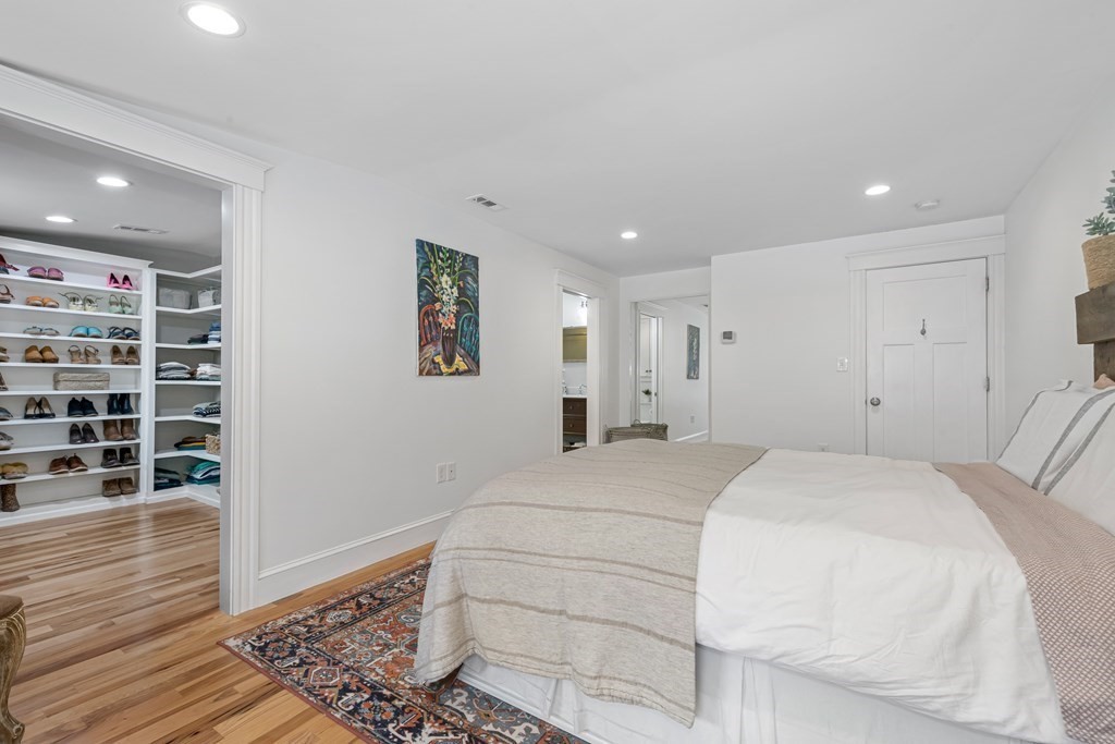 6 Storey Avenue Newburyport, MA 01950 - Photo 23 of 41 a spacious bedroom with a bed and a window
