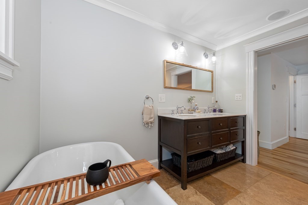 6 Storey Avenue Newburyport, MA 01950 - Photo 27 of 41 a room with a baby bed and a bathroom