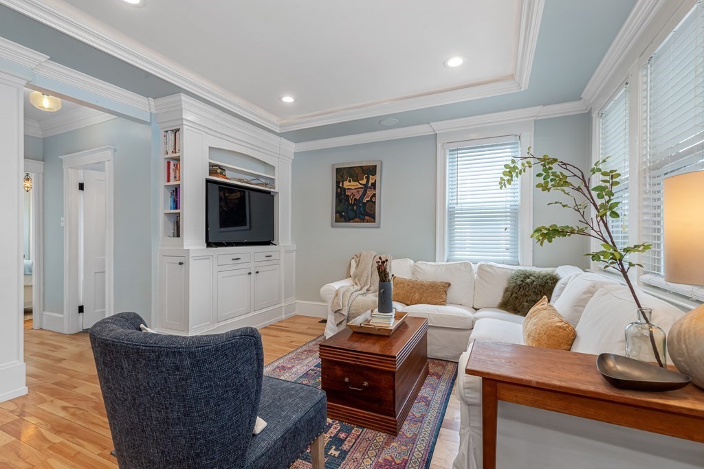 6 Storey Avenue Newburyport, MA 01950 - Photo 8 of 41 a living room with furniture and a flat screen tv
