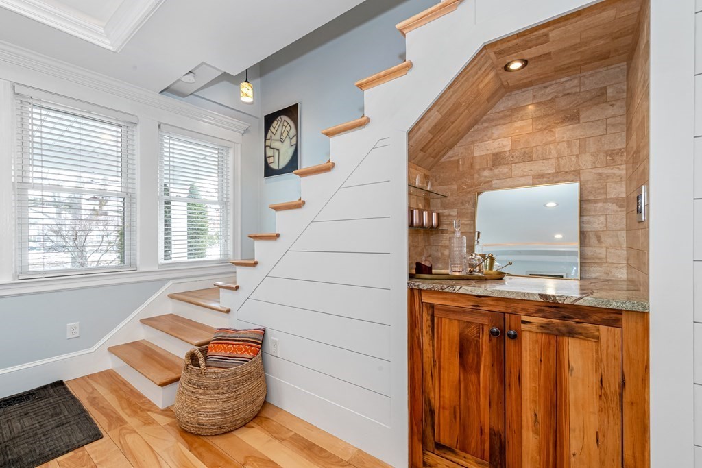 6 Storey Avenue Newburyport, MA 01950 - Photo 10 of 41 a living room with a stove and a window