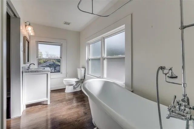 a living room with furniture and white walls