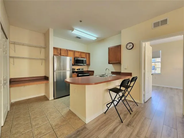 a view of a livingroom with furniture and window