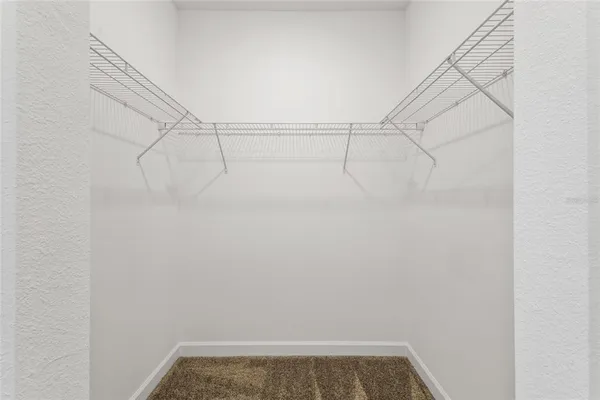 a view of small space with racks on the wall
