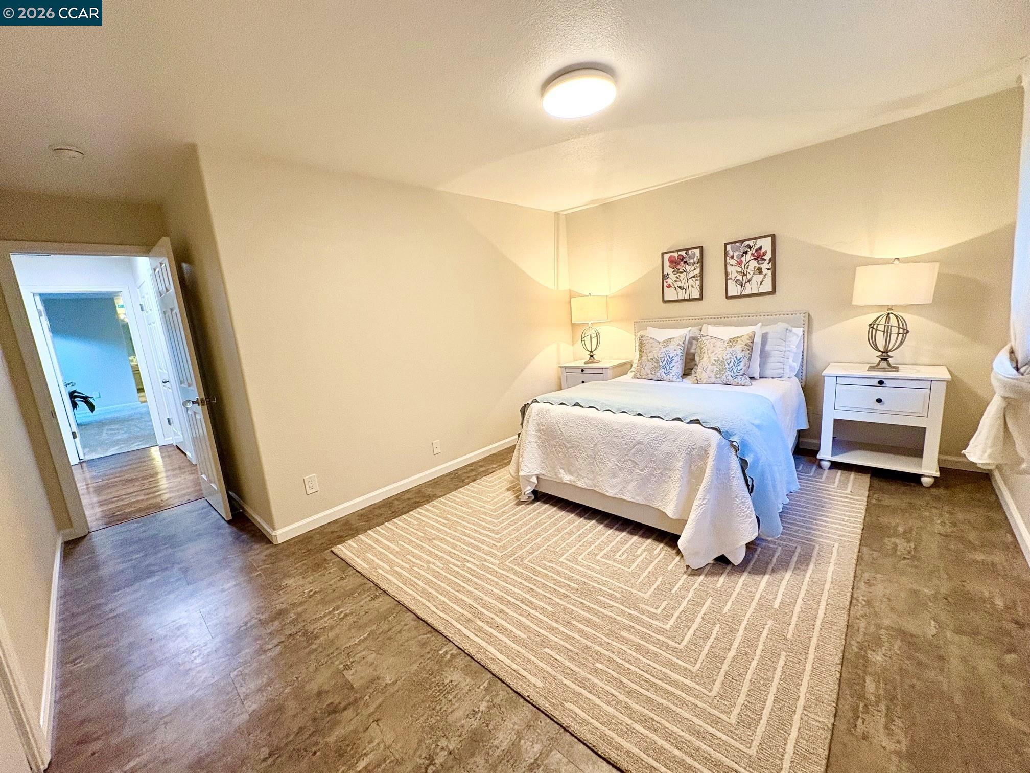 2589 Pebble Beach Loop Lafayette, CA 94549 - Photo 20 of 32 a bedroom with a bed and a couch