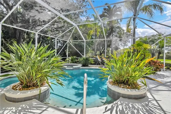 a view of a garden with a fountain