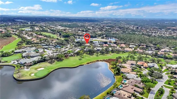 an aerial view of residential house with outdoor space