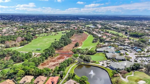 a view of swimming pool with outdoor seating