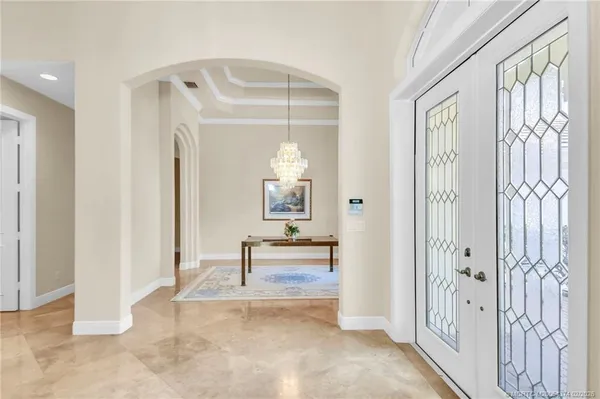 a view of a bathroom with tub and shower