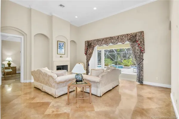 a house view with a seating space and garden view