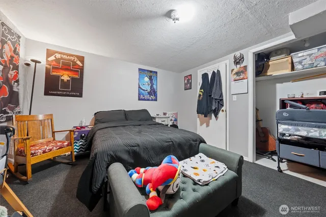 a bedroom with furniture and a couch