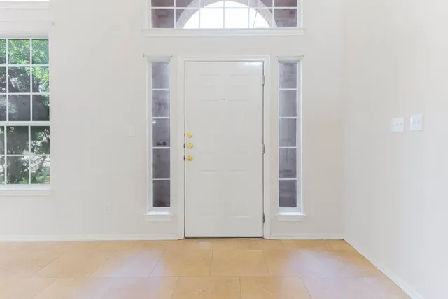 an empty room with windows