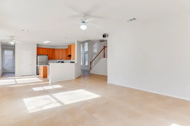 a view of a kitchen with furniture and a kitchen