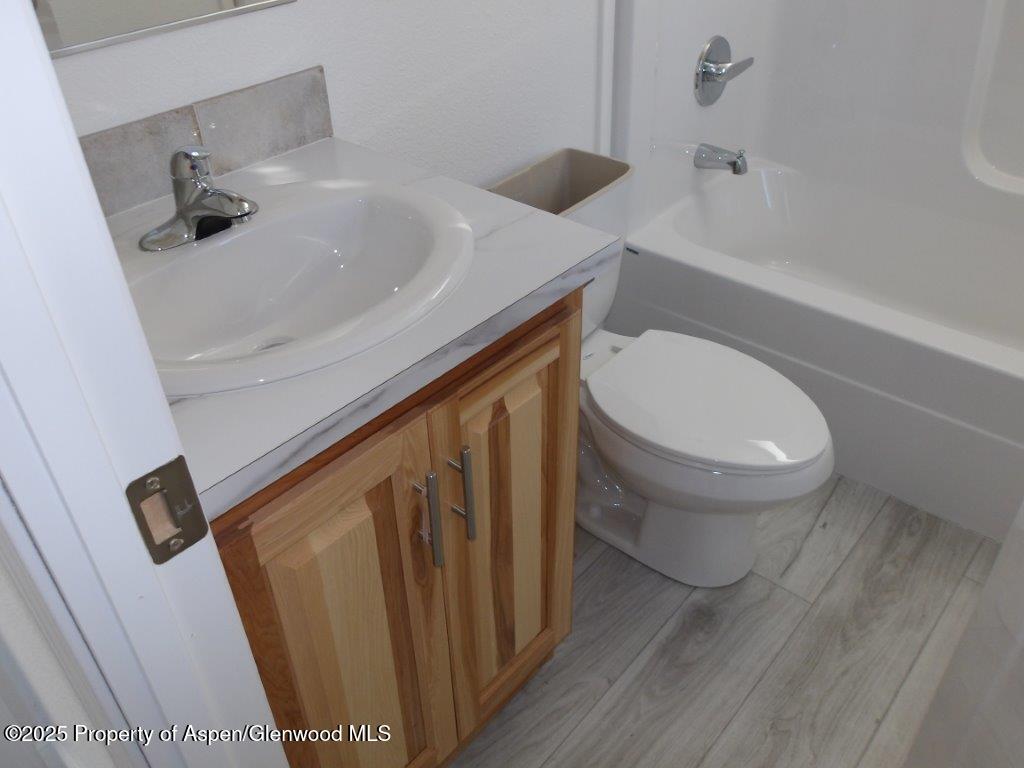13 North Highway 13 Craig, CO 81625 - Photo 12 of 16 a bathroom with a sink and toilet