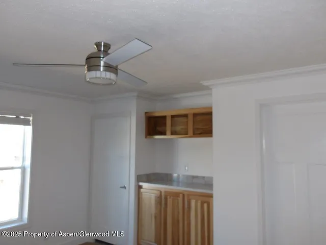 a view of a livingroom and a window