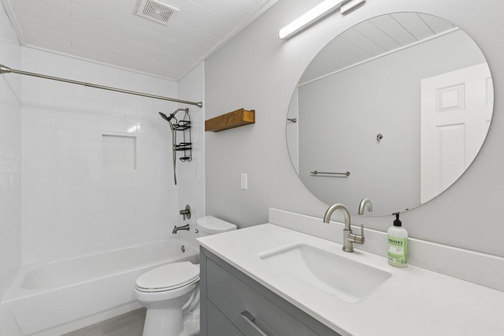 2120 Traywick Chase Alpharetta, GA 30004 - Photo 37 of 54 a bathroom with a granite countertop sink toilet and shower
