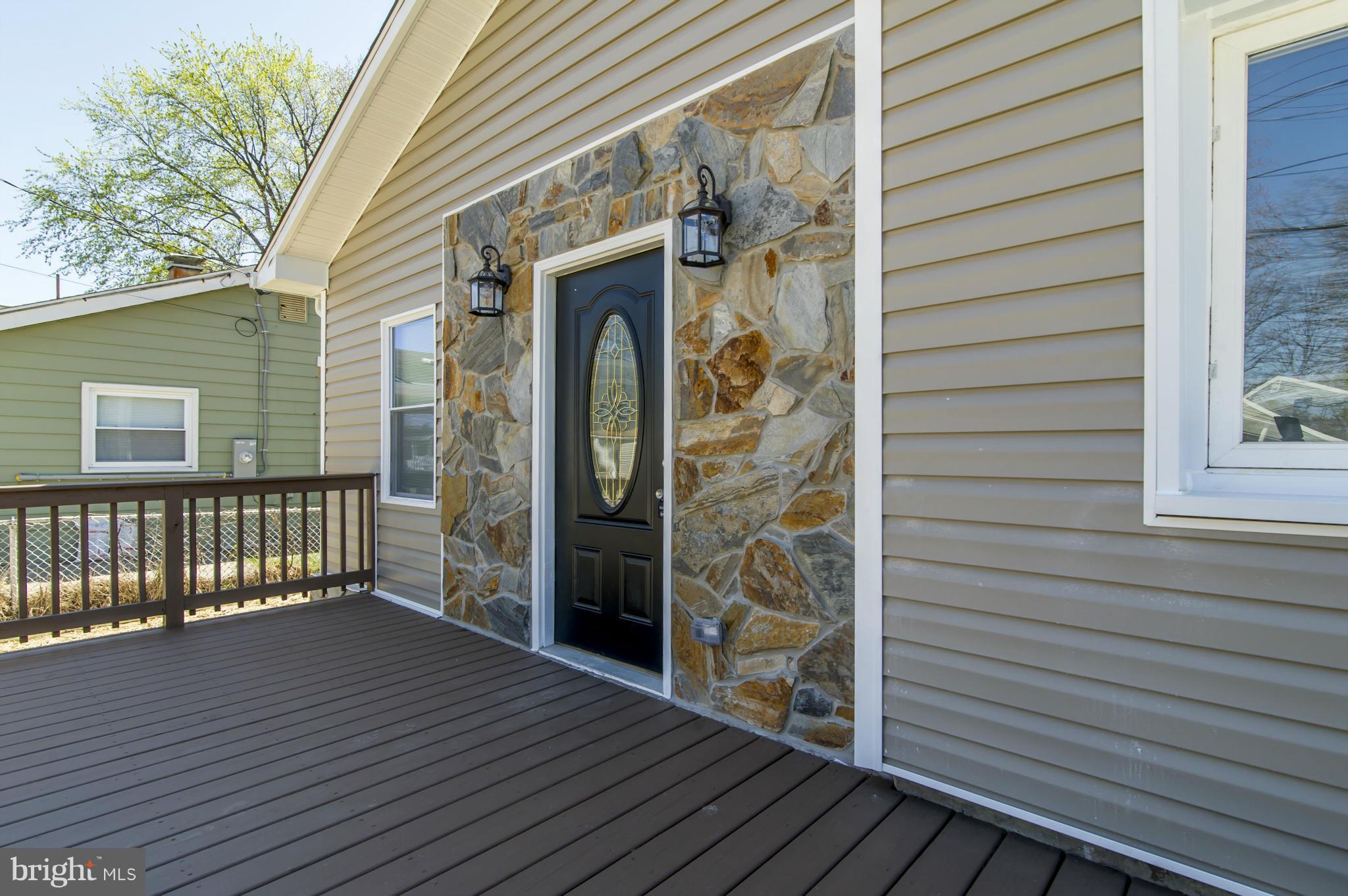 1210 3rd Road Baltimore, MD 21220 - Photo 5 of 26 a view of front door deck