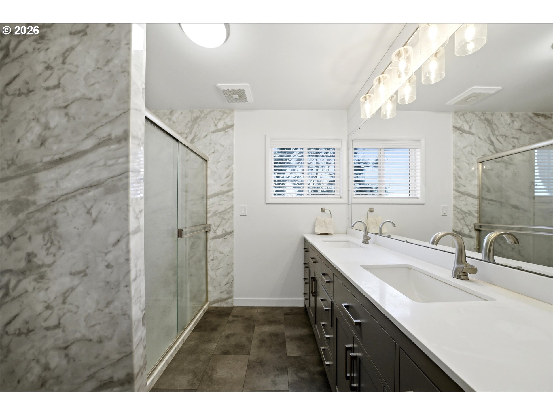 825 West Ridgeway Avenue Hermiston, OR 97838 - Photo 17 of 33 a bathroom with a sink double vanity and a mirror