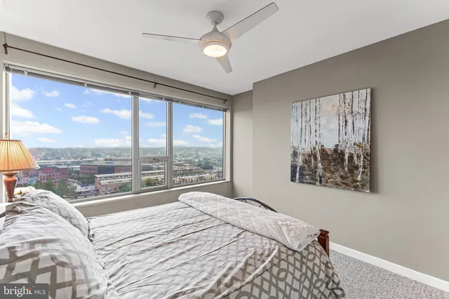 a bathroom with a shower and a sink