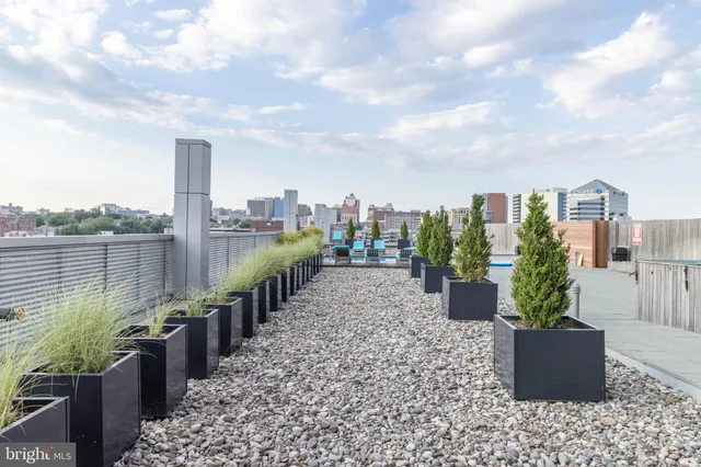 an aerial view of a house with a lake view