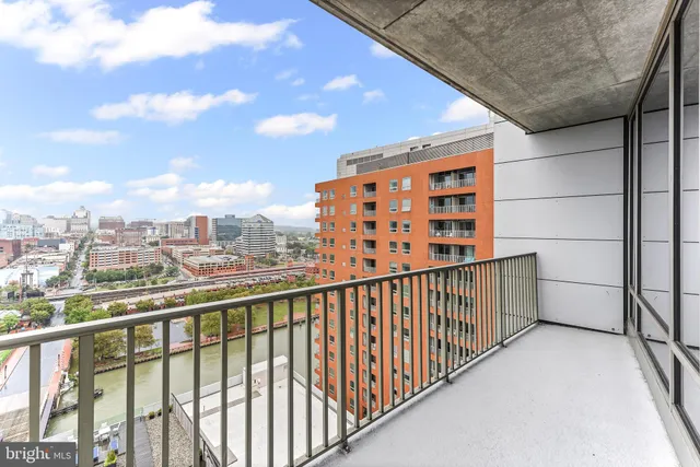 a view of a city with a lake