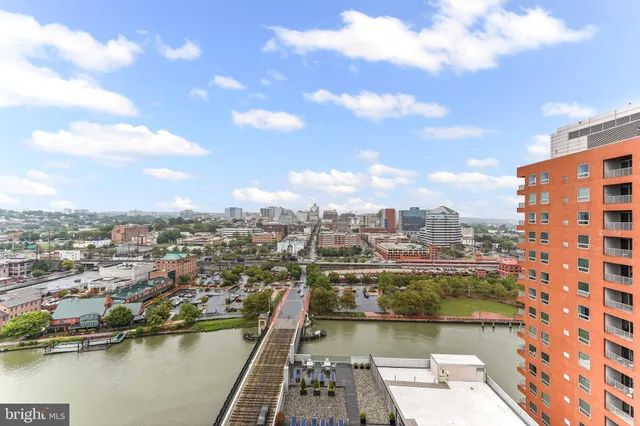 a view of a city and lake