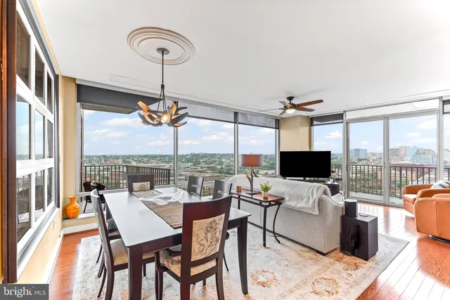a view of a dining room with furniture window and outside view