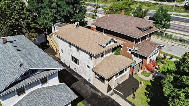an aerial view of a house with balcony