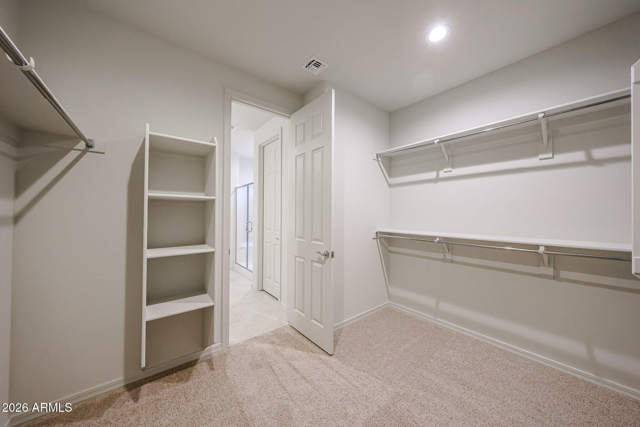7078 West Plum Road Peoria, AZ 85383 - Photo 12 of 23 a view of an empty walk in closet