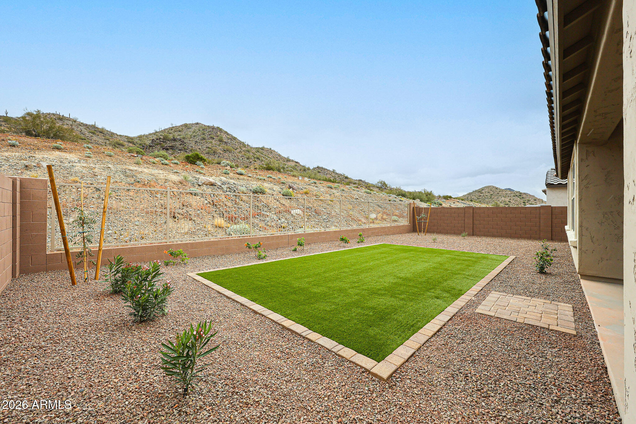 7078 West Plum Road Peoria, AZ 85383 - Photo 22 of 23 a view of a mountain with a garden