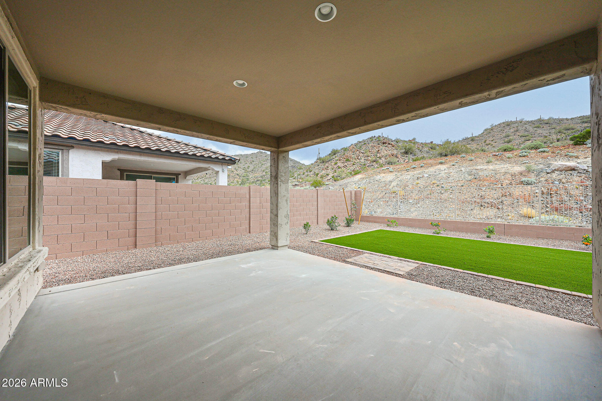 7078 West Plum Road Peoria, AZ 85383 - Photo 23 of 23 a view of a big room with wooden fence