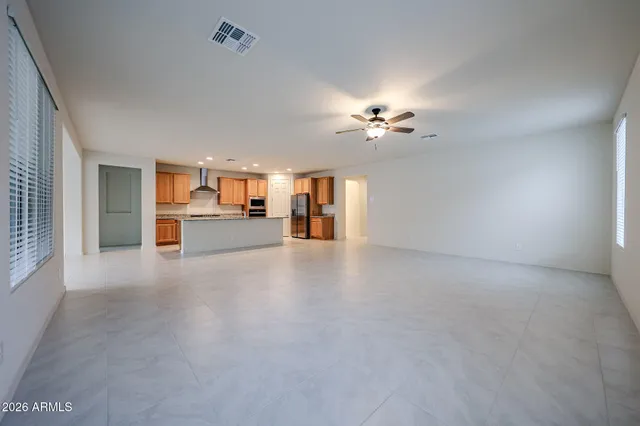 a view of a livingroom with a kitchen
