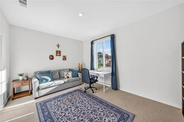 a living room with a couch and a couch