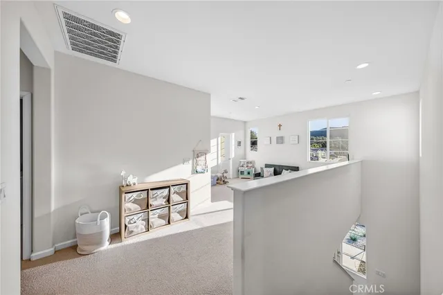 a bathroom with a sink double vanity granite tub and a mirror