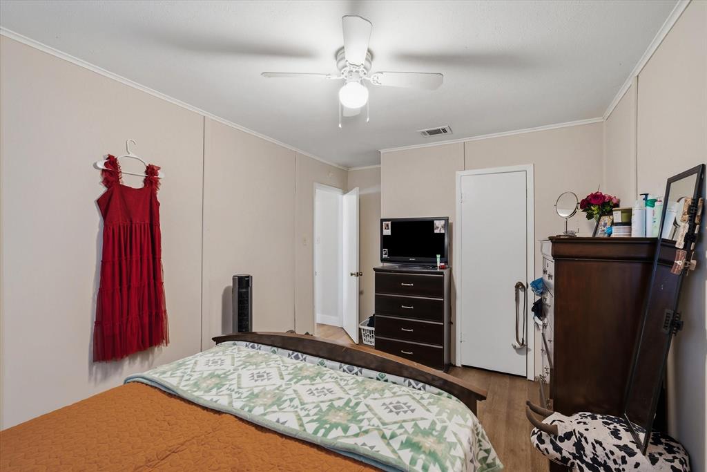 700 Amy Street Canton, TX 75103 - Photo 13 of 35 a bedroom with furniture and a closet