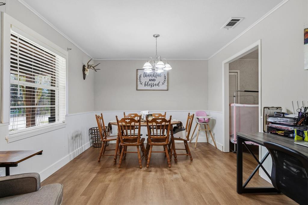 700 Amy Street Canton, TX 75103 - Photo 14 of 35 a view of a dining room with furniture window and wooden floor
