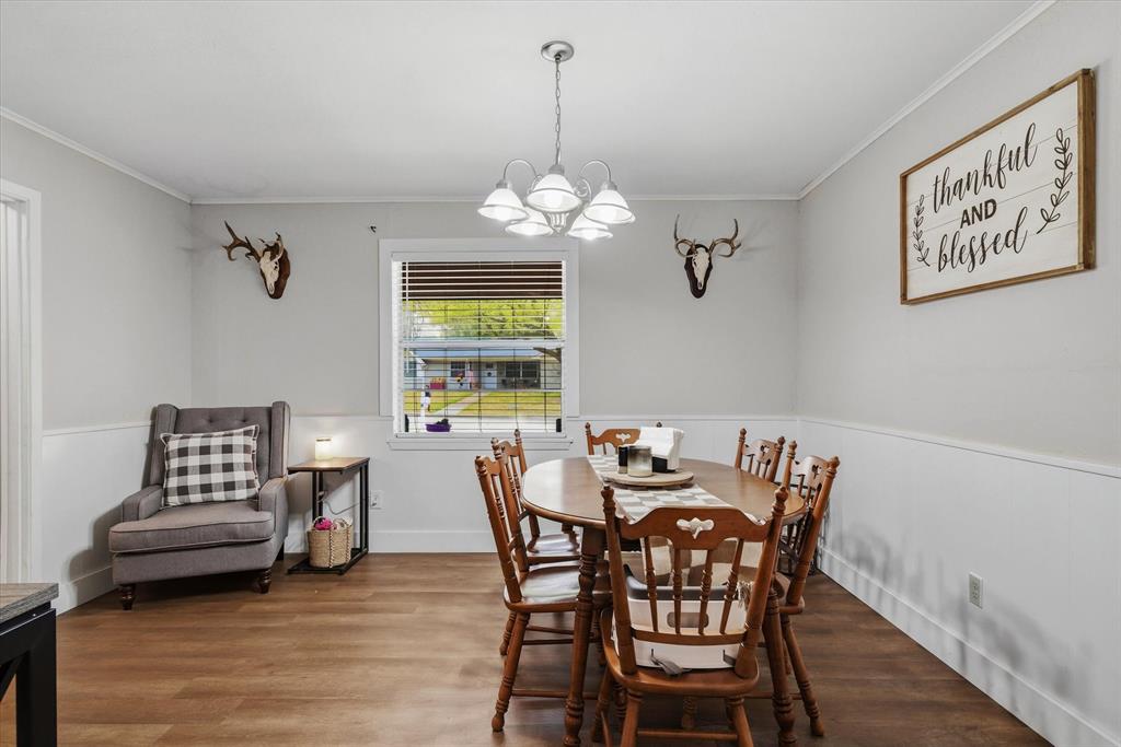 700 Amy Street Canton, TX 75103 - Photo 15 of 35 a view of a dining room with furniture window and wooden floor