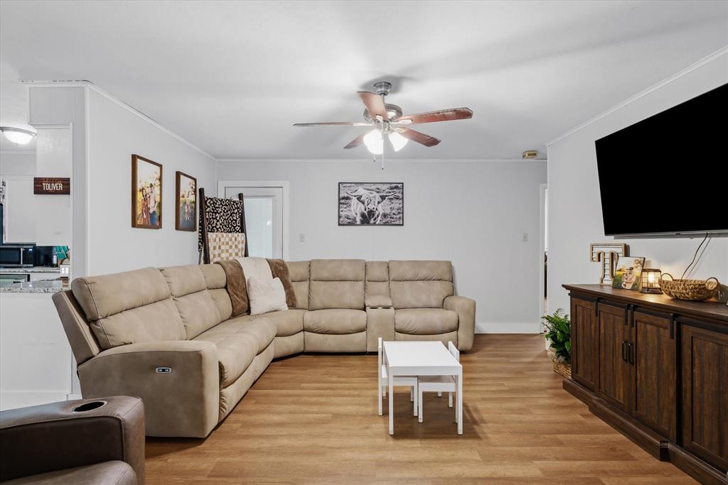 700 Amy Street Canton, TX 75103 - Photo 16 of 35 a living room with furniture and a flat screen tv